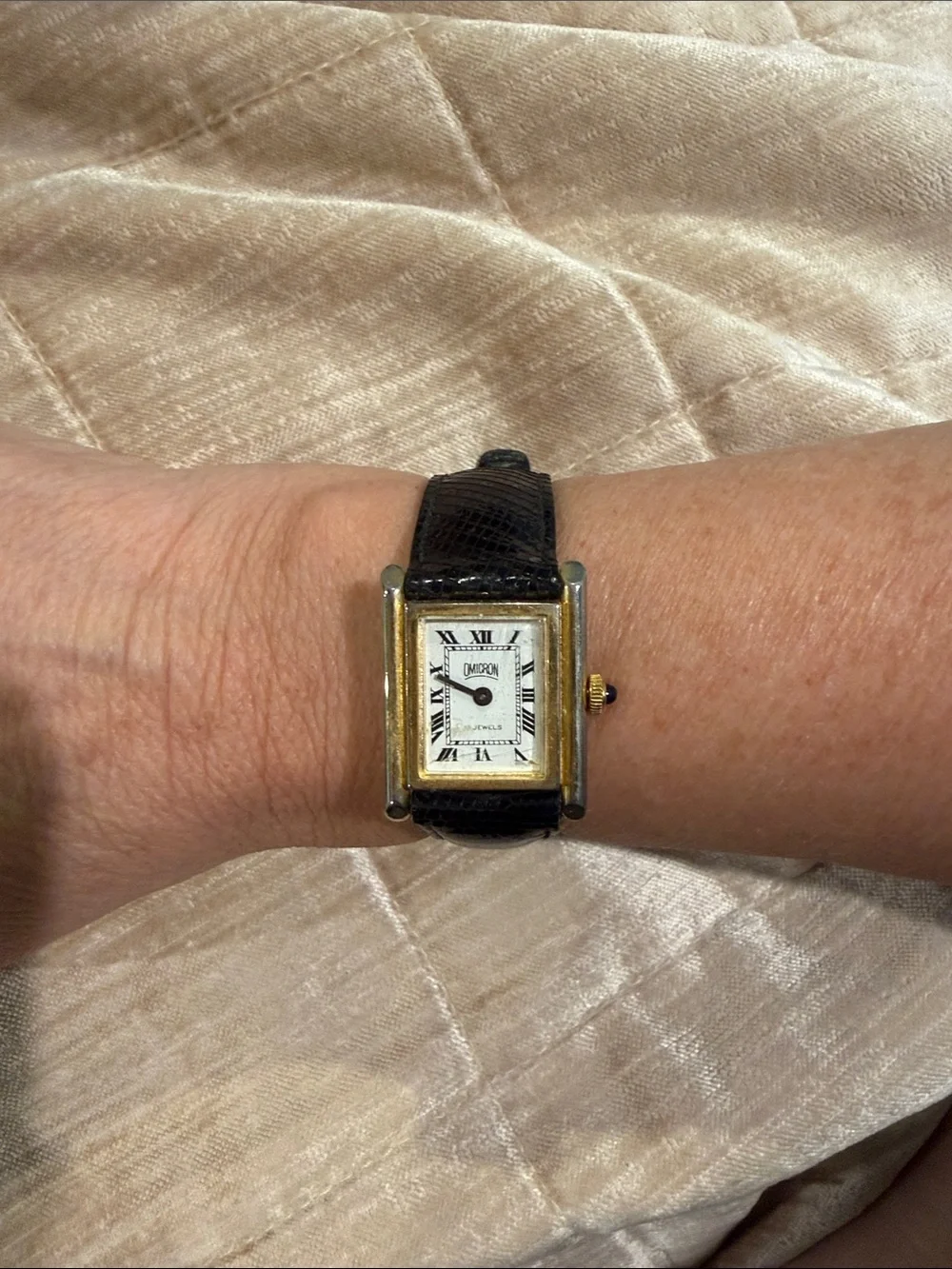 Vintage Omicron tank watch with blue sapphire and genuine lizard strap